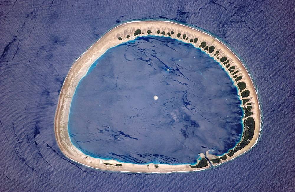 Classically shaped atoll is part of the Caroline Islands, which stretch northeast of Papua New Guinea in the western Pacific
