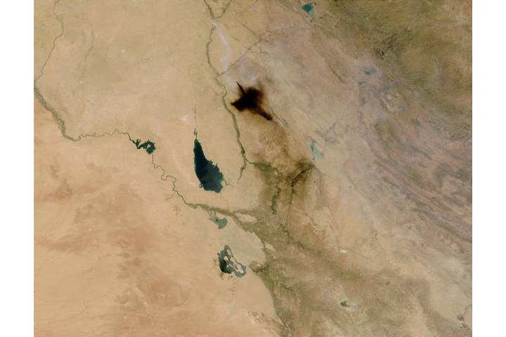 Smoke plume from oil fire near Baghdad, Iraq - selected image