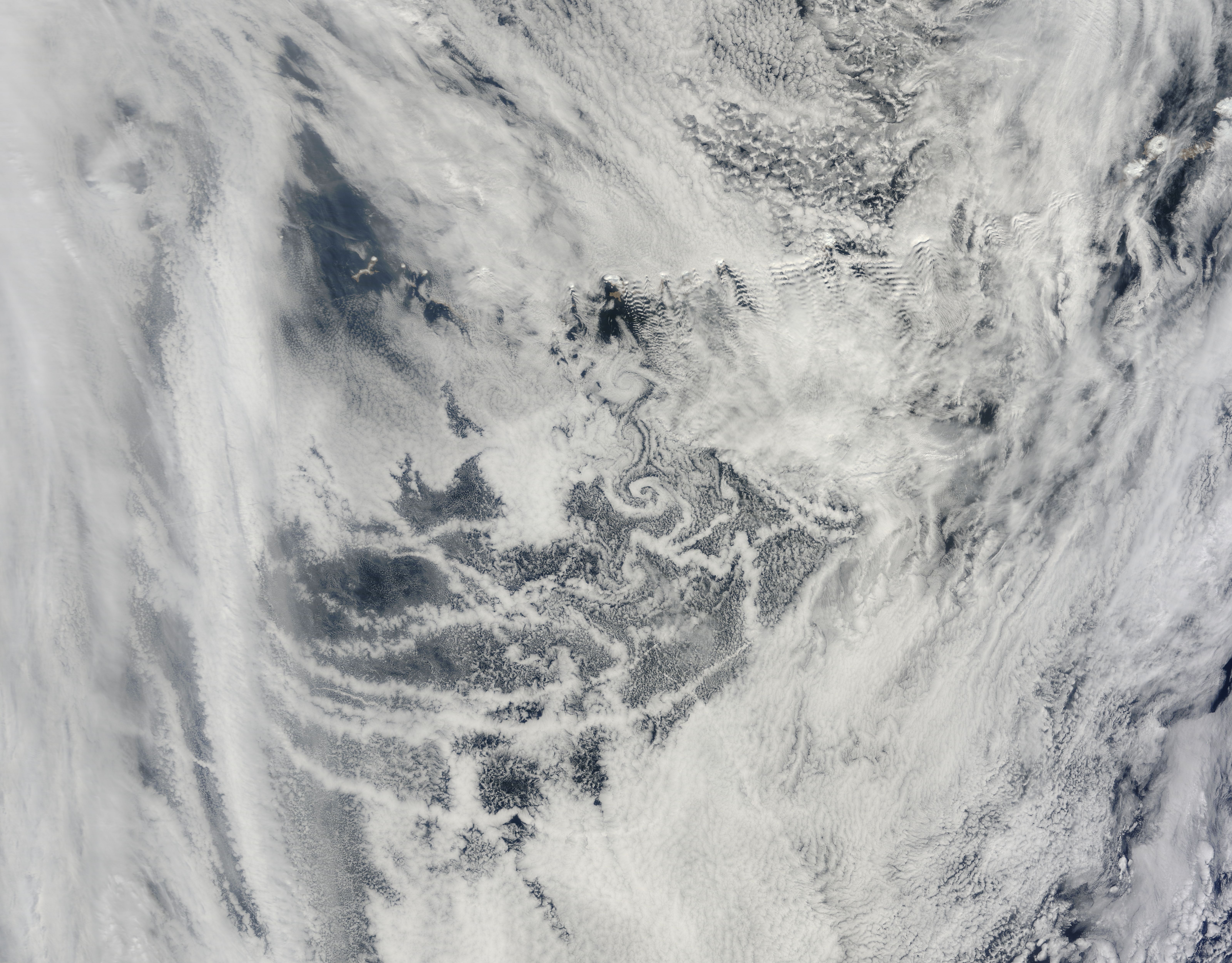 Ship tracks, cloud vortices, and ship-wave-shaped wave clouds in the North Pacific Ocean - related image preview