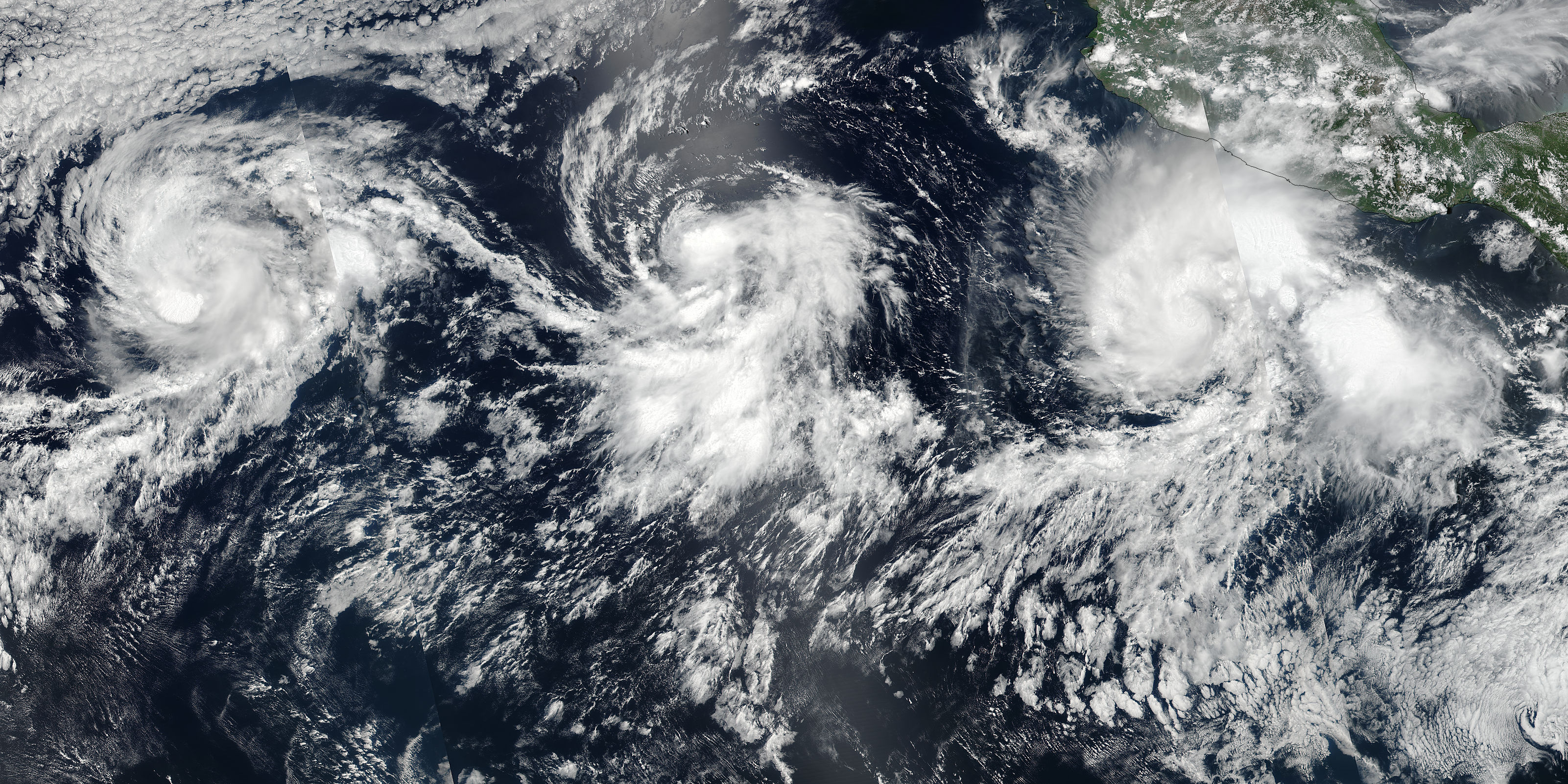 Tropical Storms Greg (07E), Irwin (10E), and Hilary (09E) in the eastern Pacific - related image preview