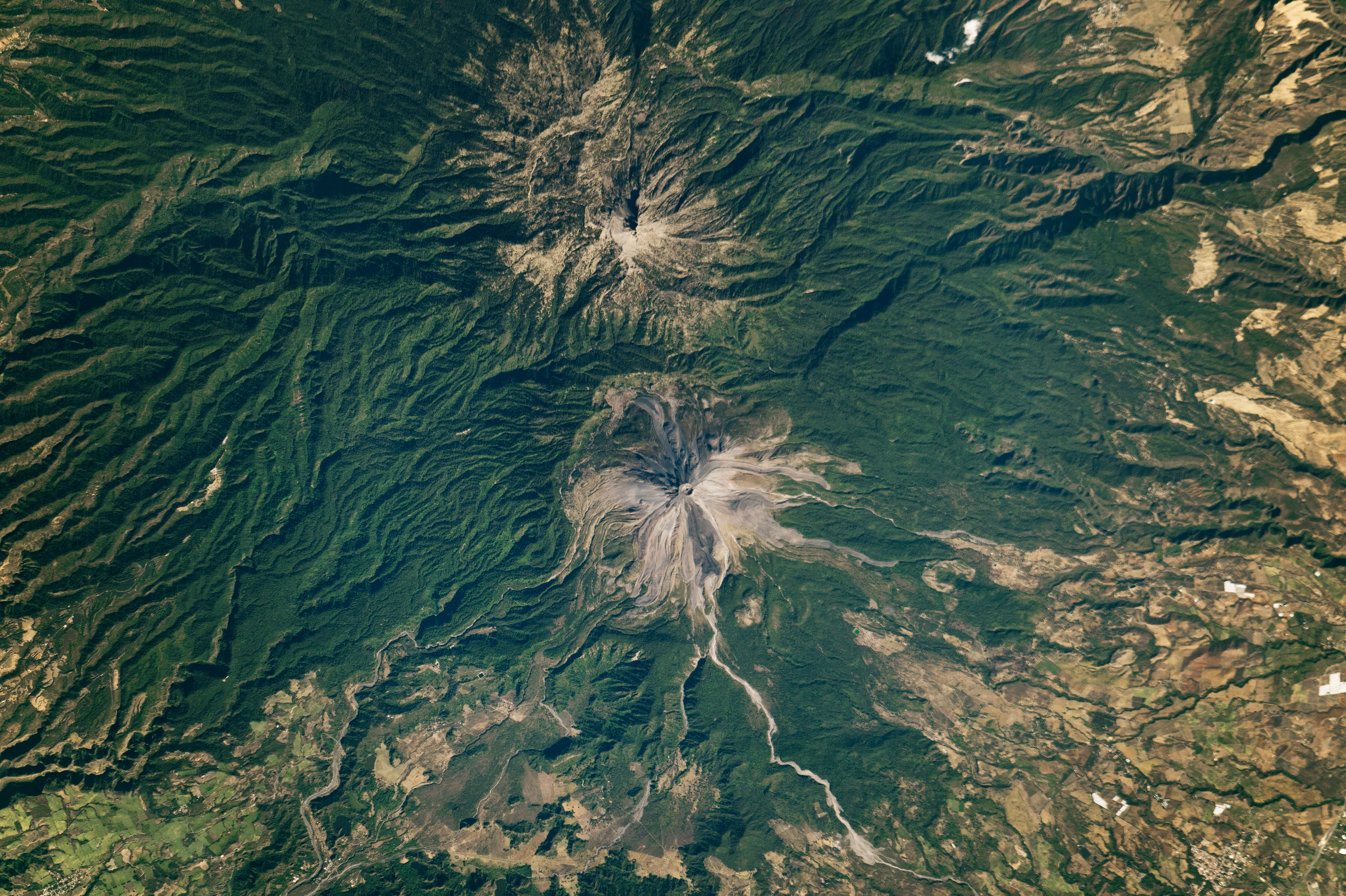 Two Volcanic Peaks that are Far from Twins - related image preview