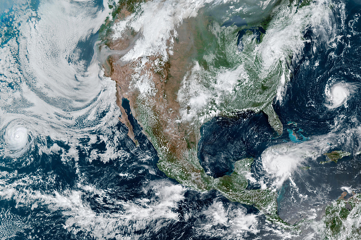 Storms Churn Around North America