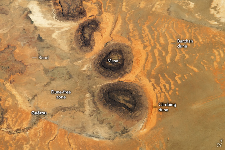 Black Mesas and Sand Dunes in Mauritania - related image preview