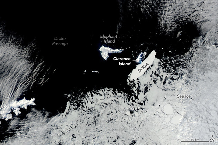 A Brief Iceberg–Island Encounter