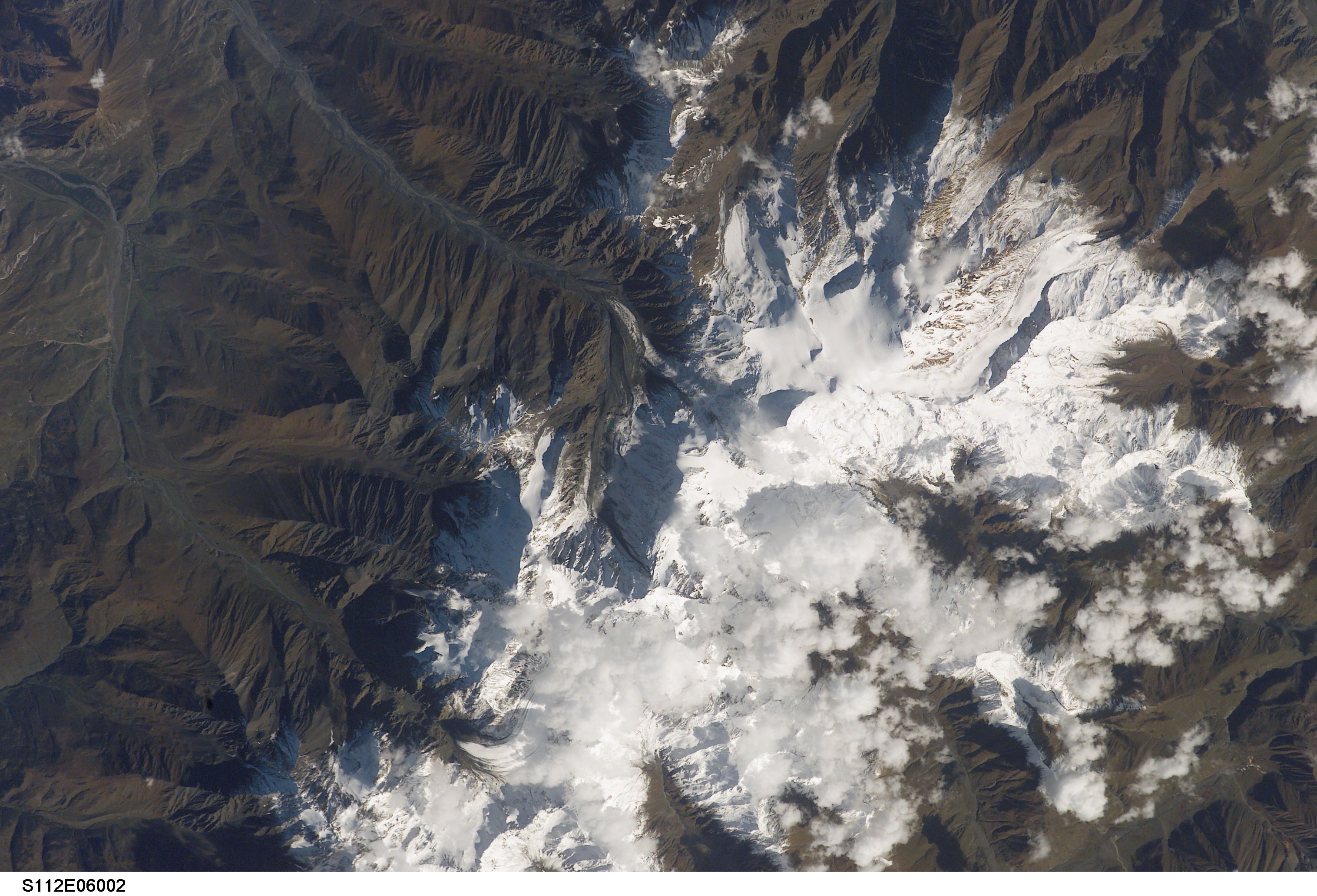 Space Shuttle view after Kolka Glacier Collapse - related image preview