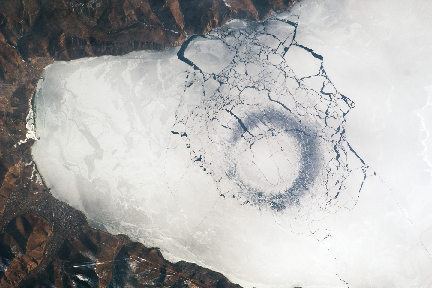 Circles In Thin Ice Lake Baikal Russia   ISS019 E 010556 Lrg 