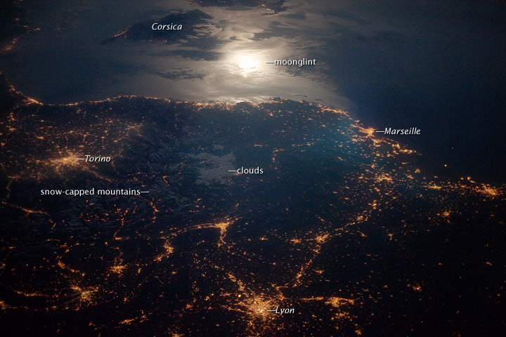 City Lights at Night along the France-Italy Border