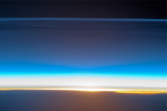 Polar Mesospheric Clouds Illuminated by Orbital Sunrise - related image preview