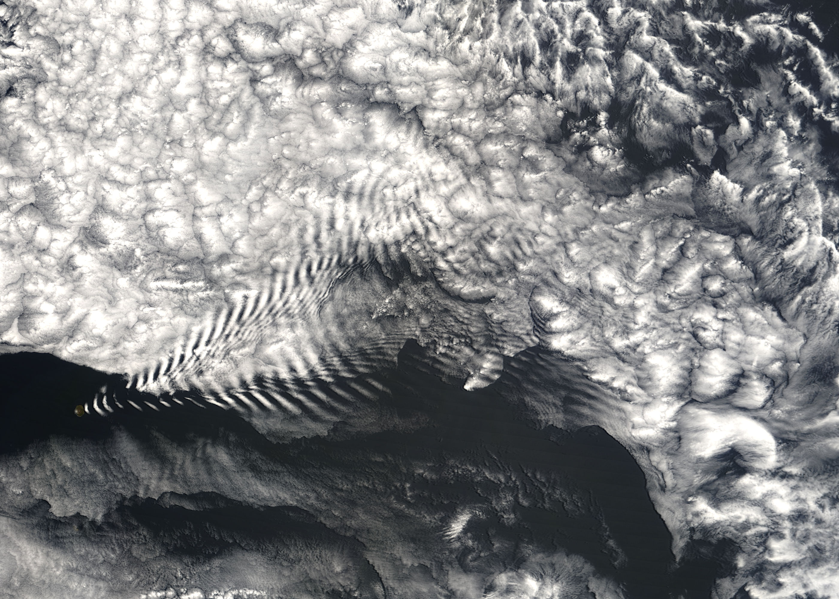 Ship-wave-shaped wave clouds induced by Amsterdam Island, Indian Ocean - related image preview