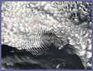 Ship-wave-shaped wave clouds induced by Amsterdam Island, Indian Ocean - selected image