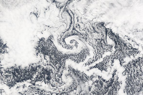 Ship Tracks and Vortices over the North Pacific Ocean
