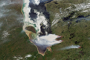 Sediment, Smoke, and Stained Ice in Quebec