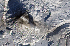 Ash, Steam, and Snow at Karymsky Volcano
