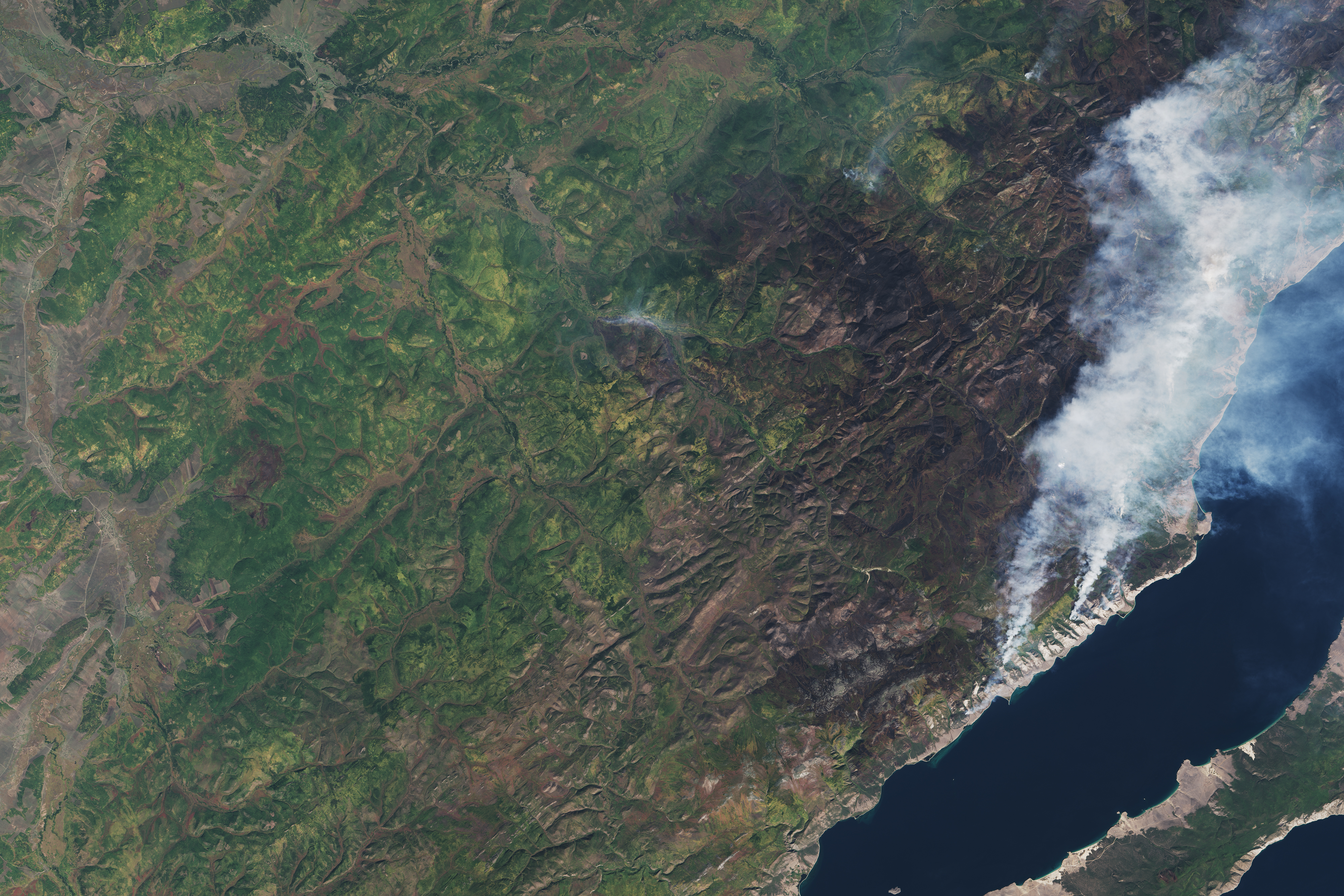 Fire and Smoke Lingers Around Lake Baikal - related image preview