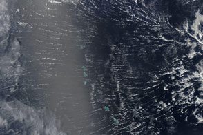 Clouds ‘Roll’ Over Pacific Atolls 